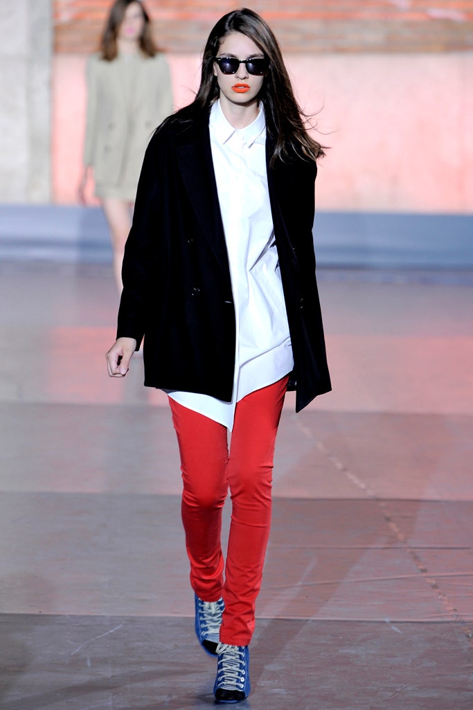 black coat white shirt red pants