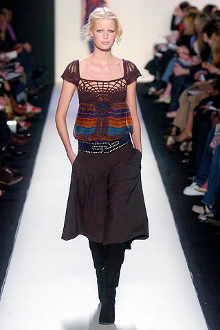 multi-colored crochet top with brown skirt
