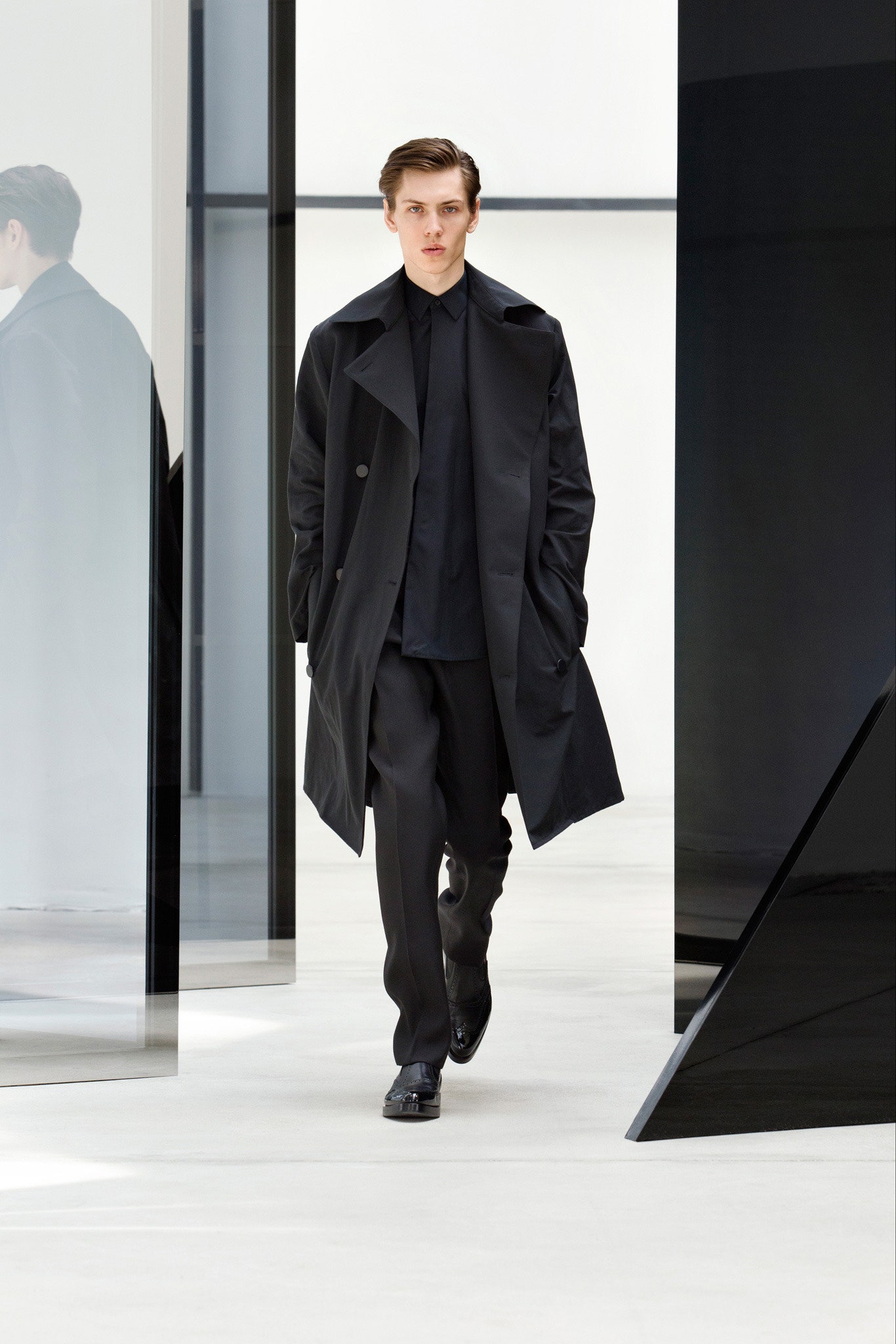 black wool coat and tailored pants