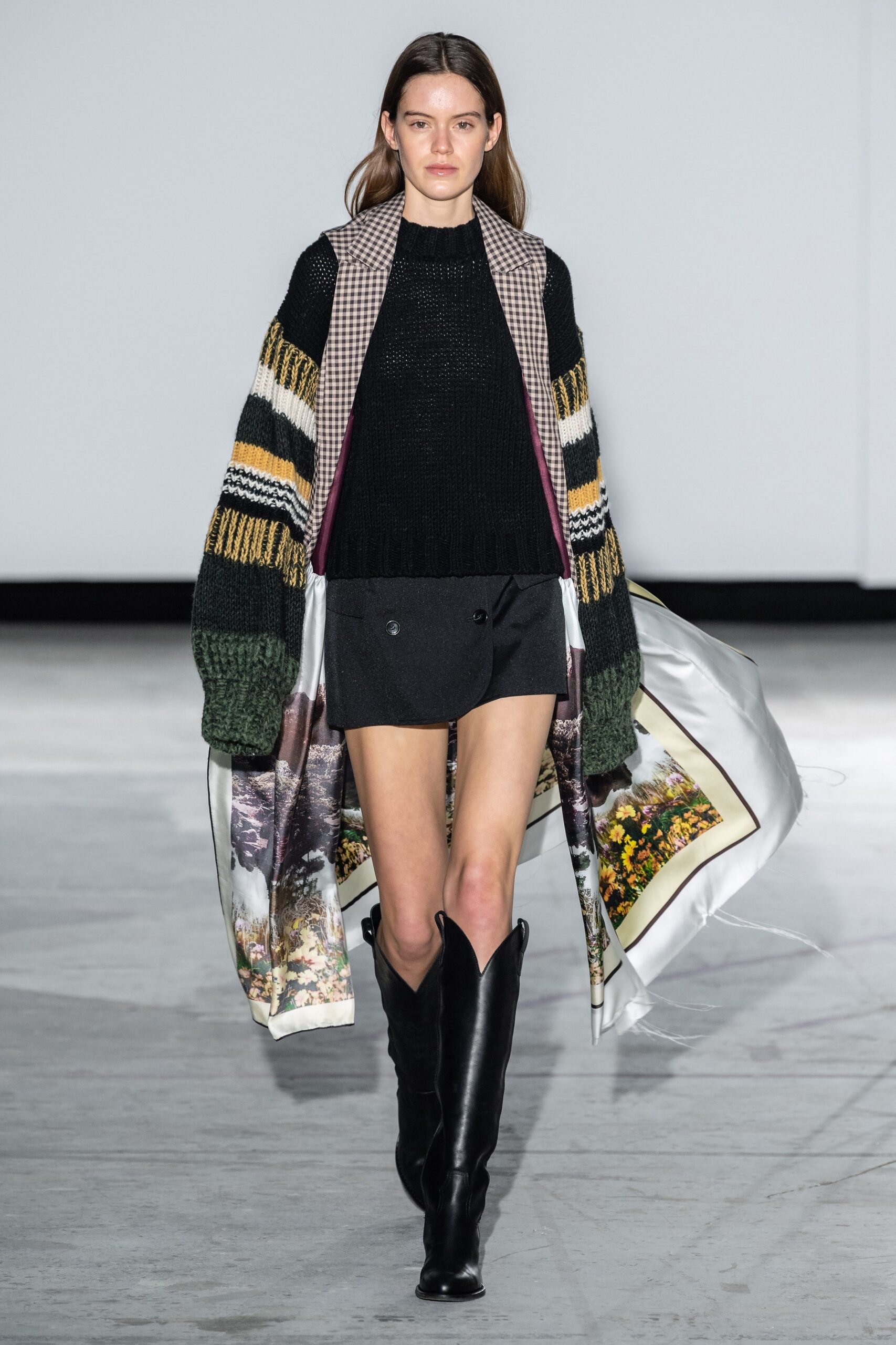 multi-layered coat with black sweater