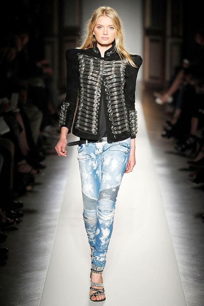 black fitted jacket with distressed jeans