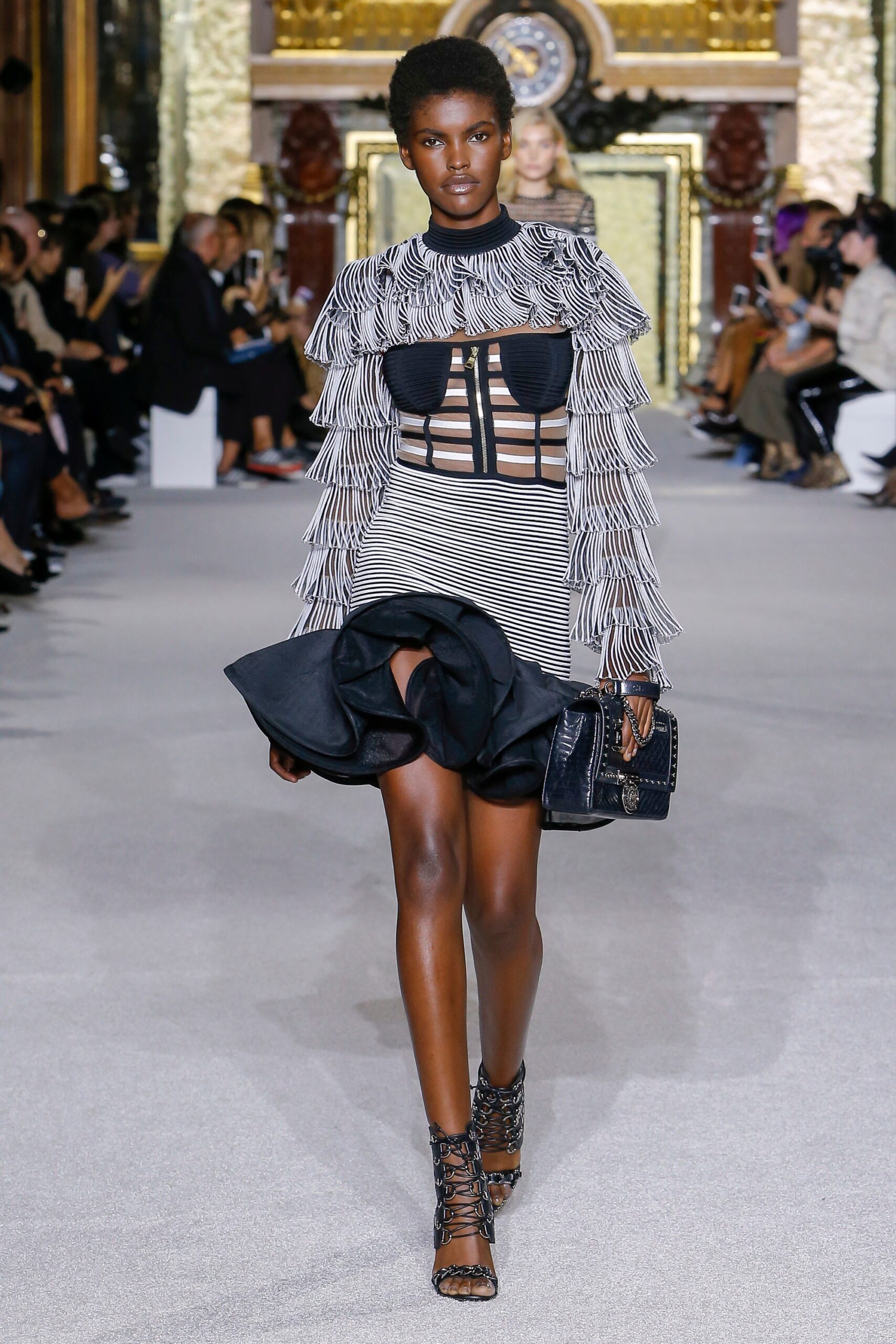 black and white ruffled top with mini skirt