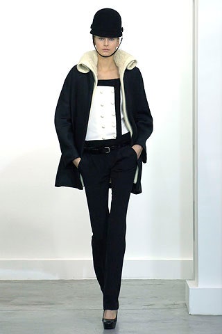 black wool coat with white top