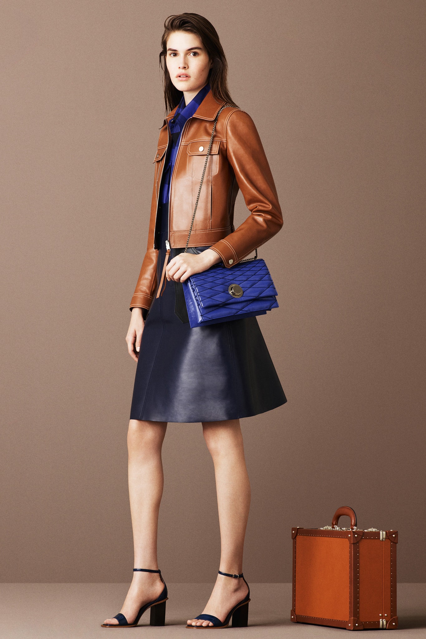 black leather midi dress with brown jacket