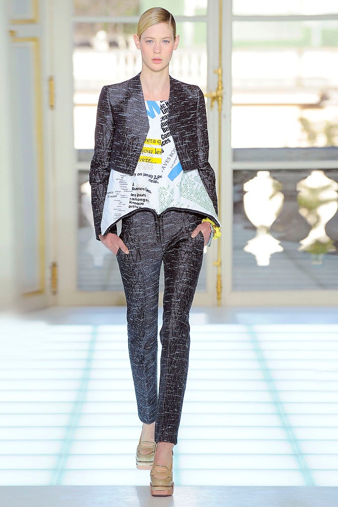 tailored black suit with printed top