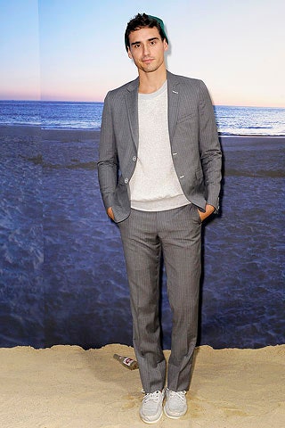 gray tailored suit with white t-shirt