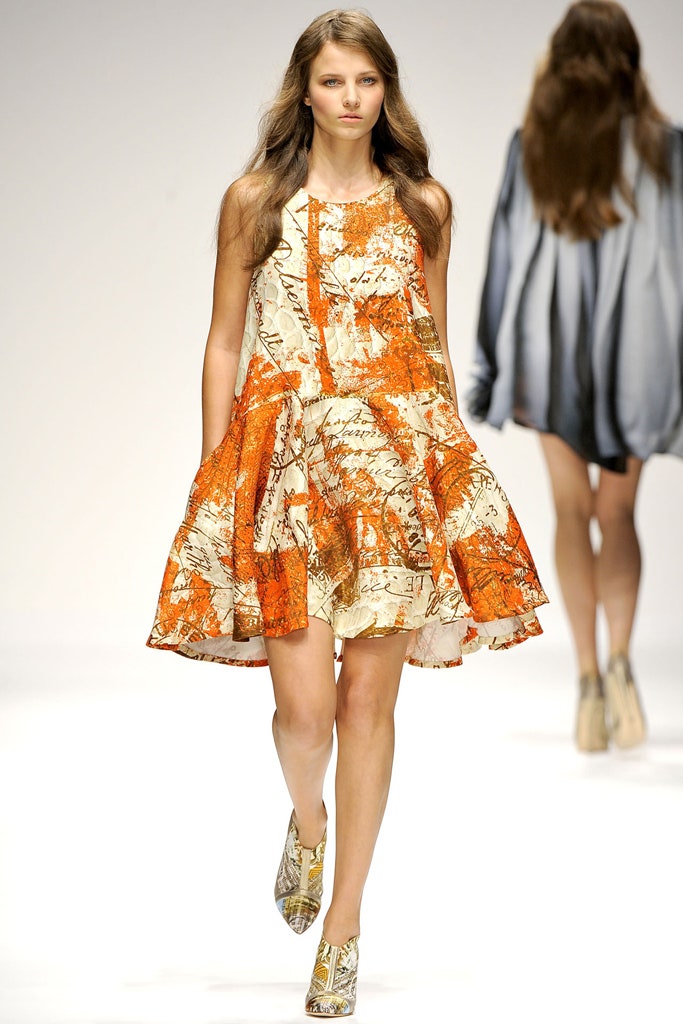 orange and white printed mini dress