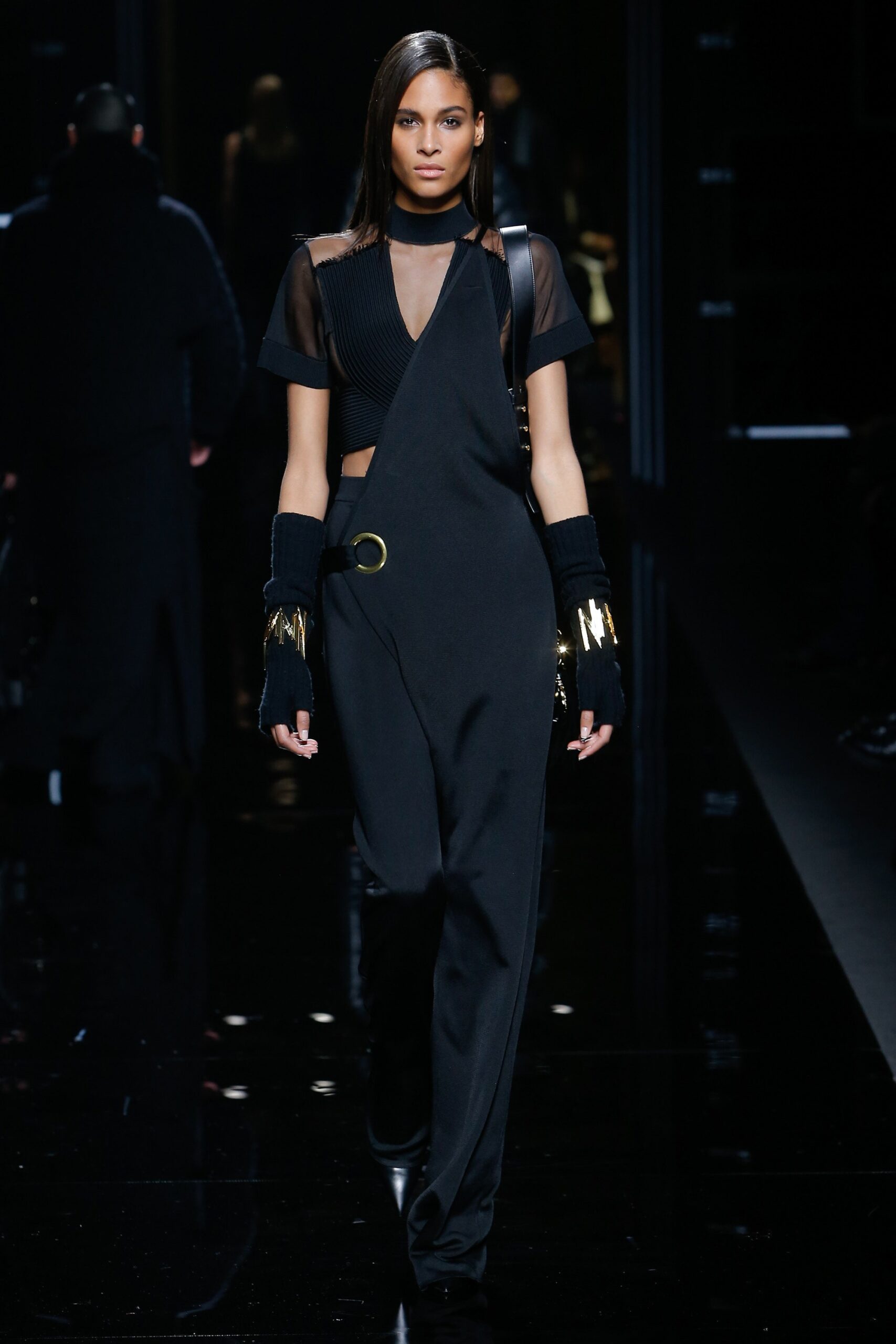 black fitted jumpsuit with gloves