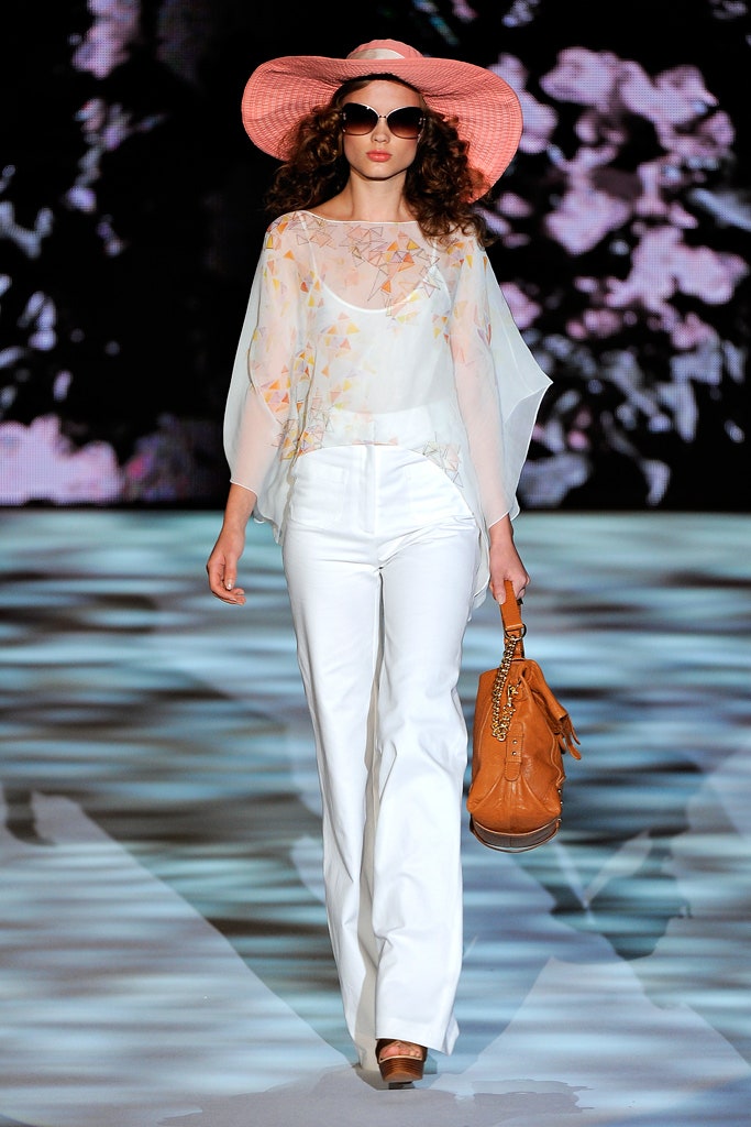 white silk relaxed top with flared pants