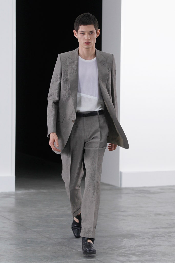 gray tailored suit with white t-shirt