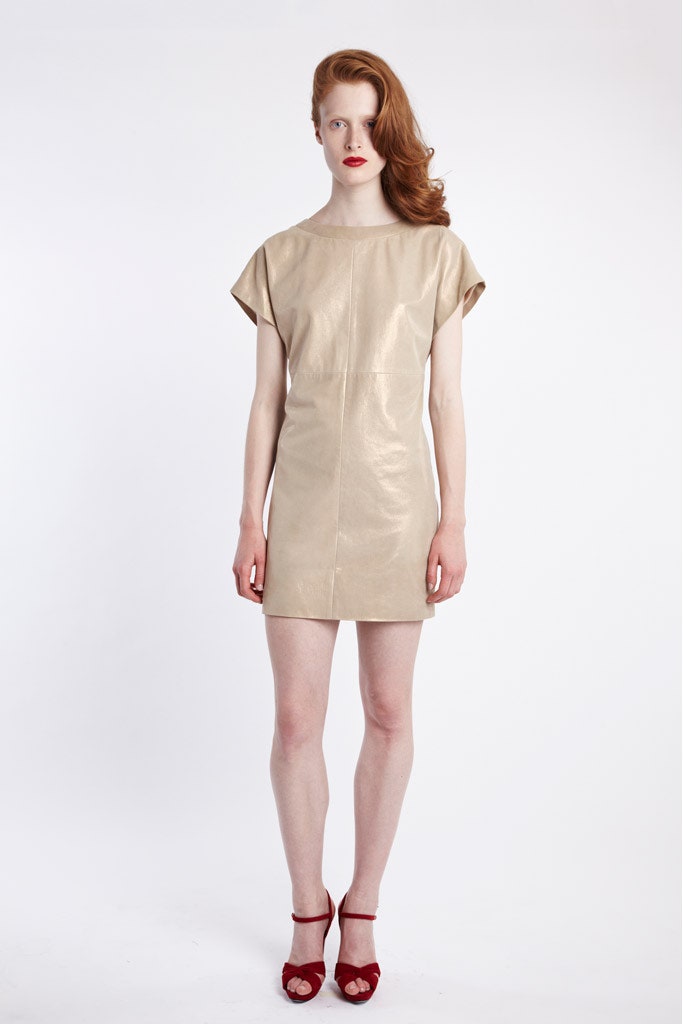 beige leather mini dress with red shoes