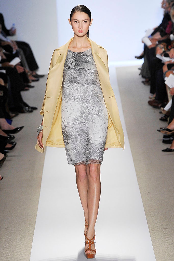 gray printed midi dress with yellow coat