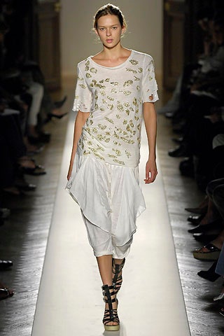white embroidered top with asymmetric pants