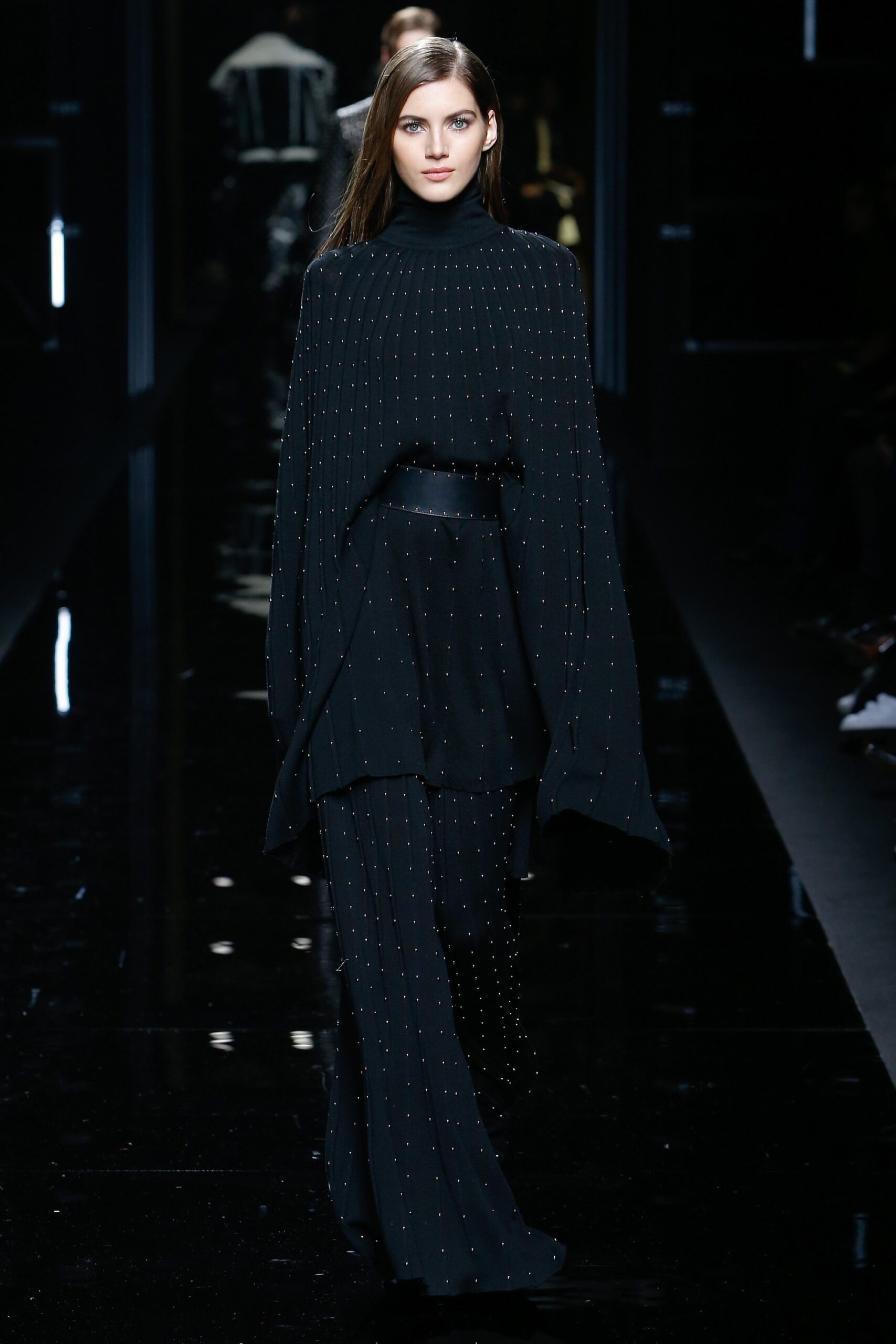 black knit relaxed top and fitted pants