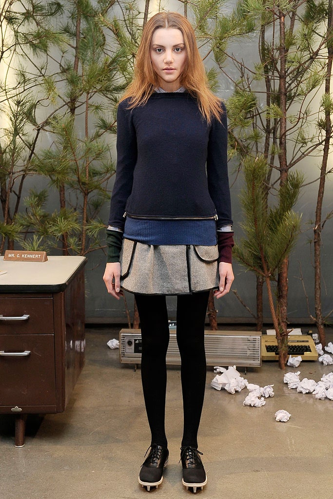 blue fitted top with gray skirt