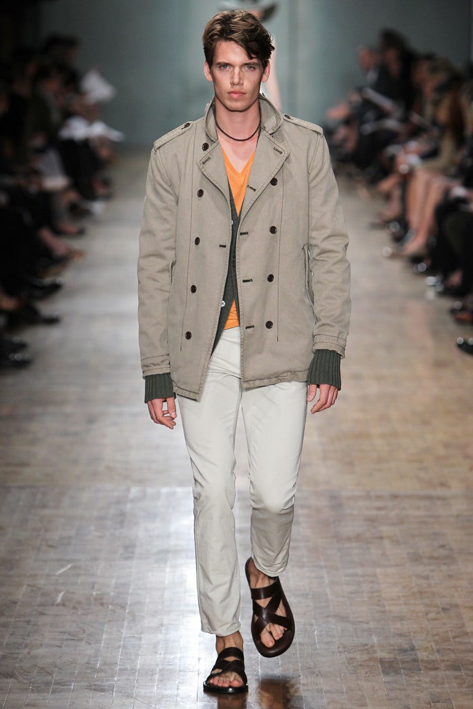 beige jacket with orange t-shirt