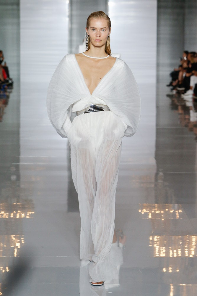 white pleated sleeveless jumpsuit