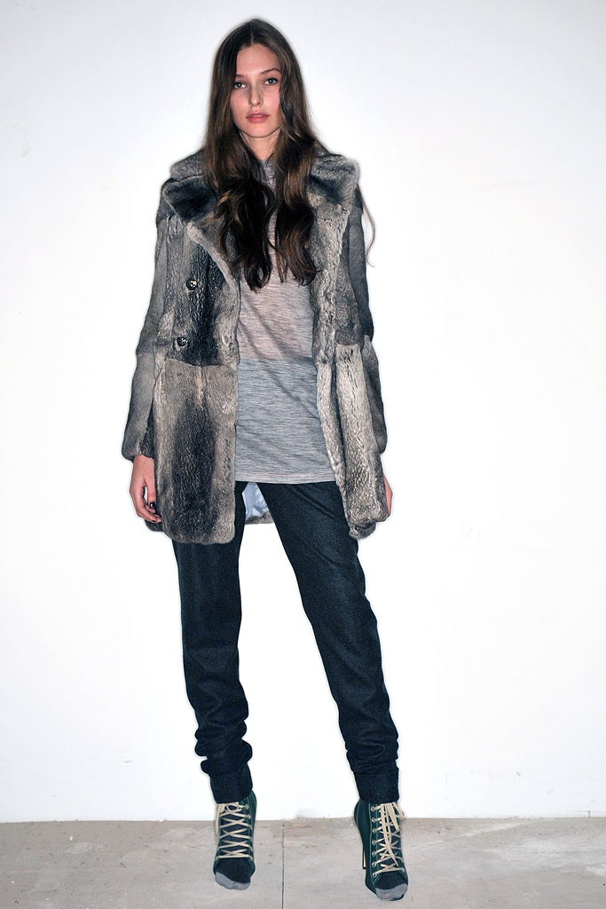 gray faux-fur coat with denim pants