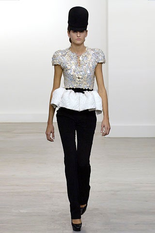 embellished white top with black pants