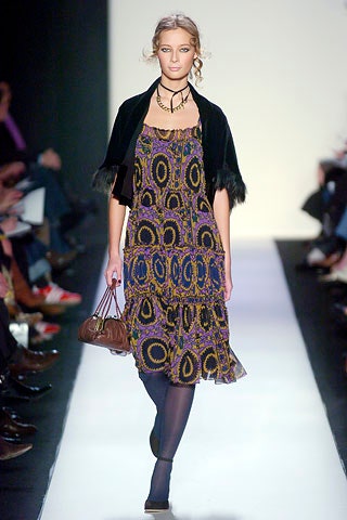 purple printed midi dress with black cape