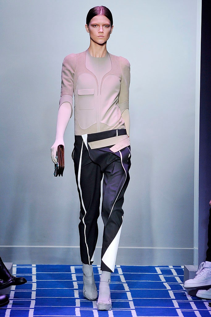 beige neoprene fitted top with black pants