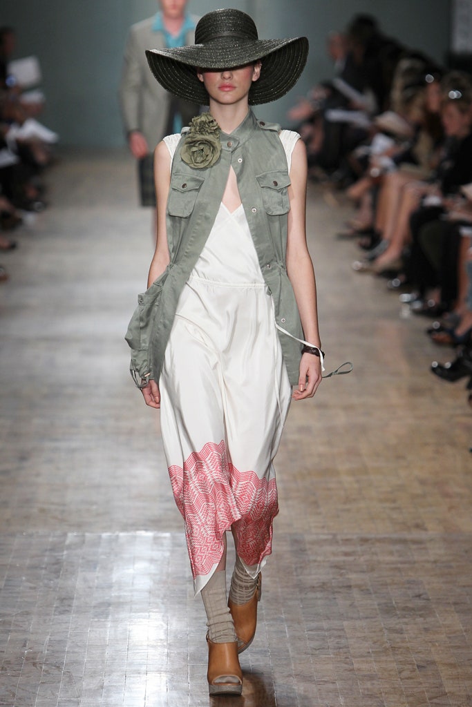 relaxed white tiered dress with green vest