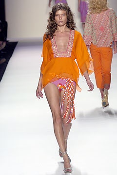 orange silk top with pink shorts