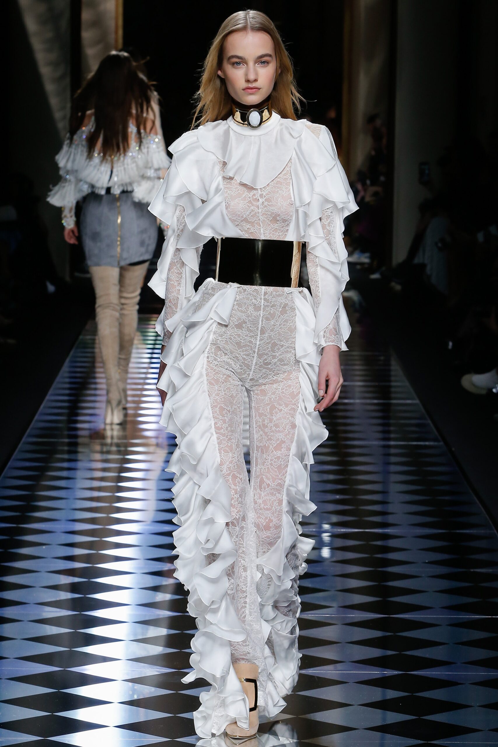 white lace ruffled gown