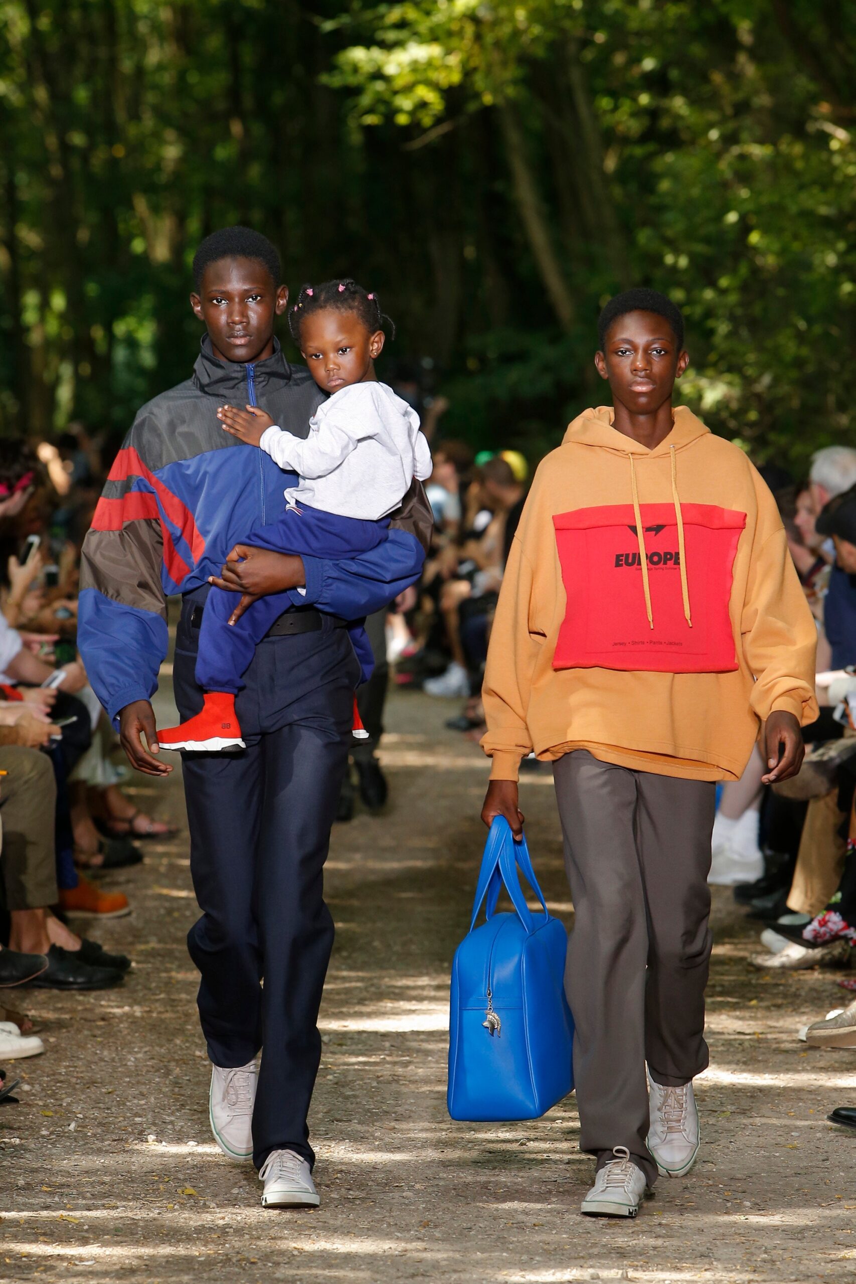 orange hoodie with gray pants