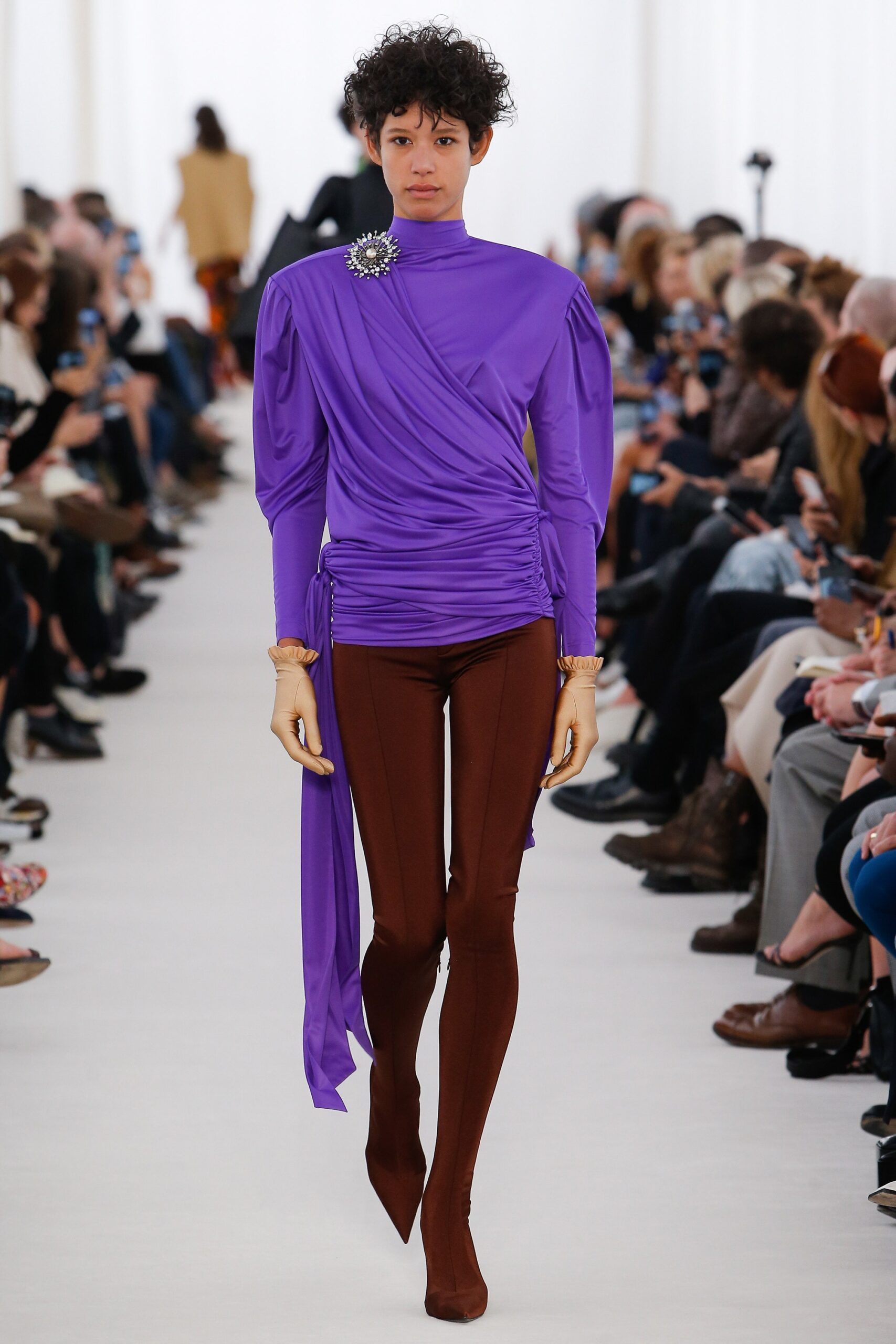 fitted purple top with brown leggings