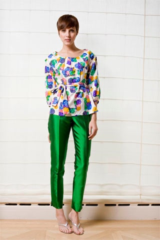 colorful printed top with green pants