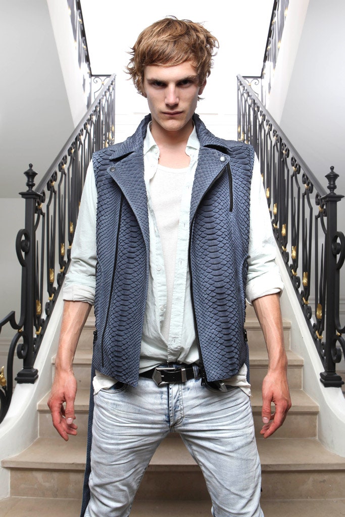 blue fitted vest with white shirt