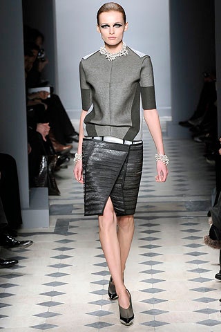 gray fitted top with black skirt