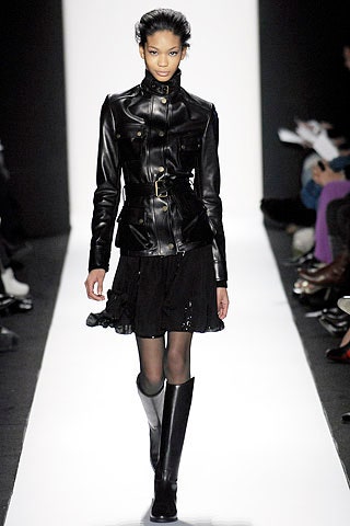 black leather fitted jacket and mini skirt