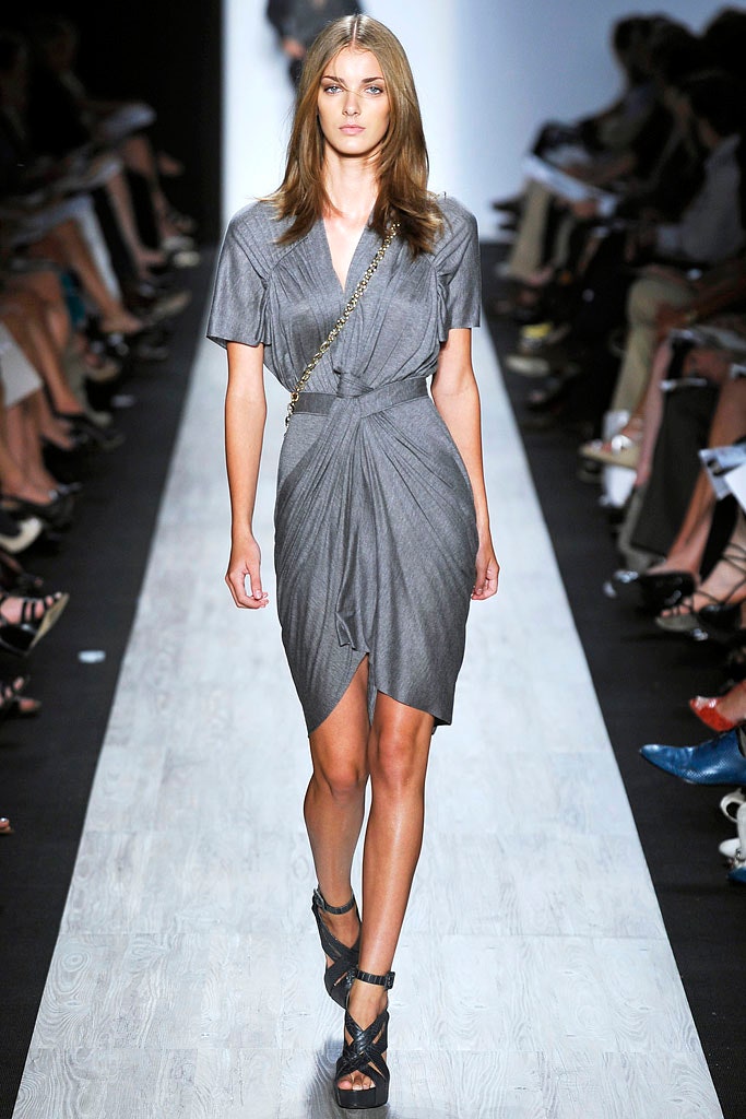 gray draped mini dress with strappy shoes