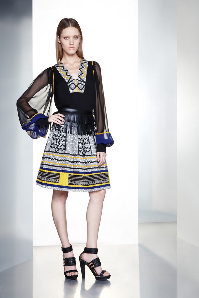 black silk blouse with pleated skirt