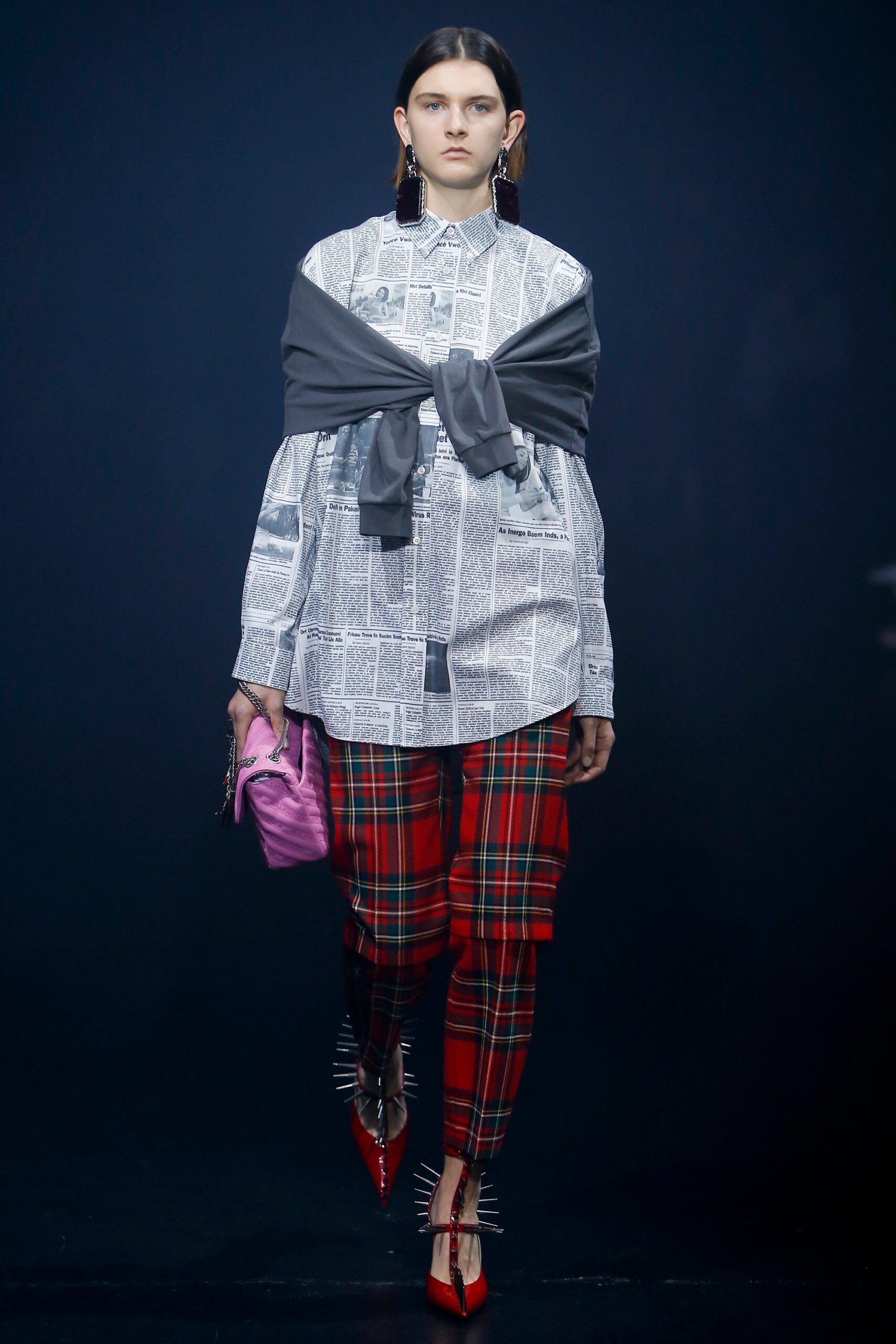 white printed shirt with red pants