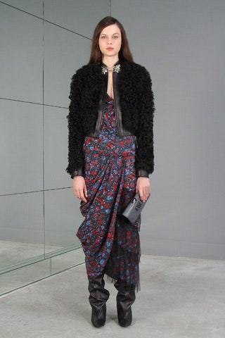 black faux-fur jacket and silk dress