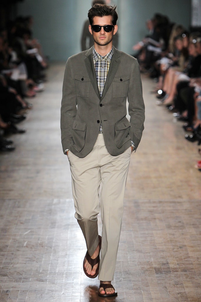 gray tailored jacket with beige pants