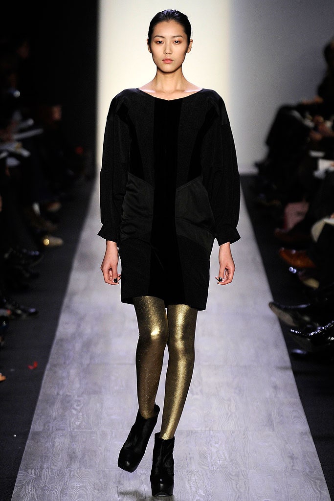 black velvet mini dress with gold leggings