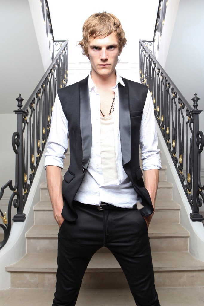 black fitted vest with white shirt