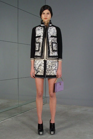 fitted black and white jacket with mini skirt