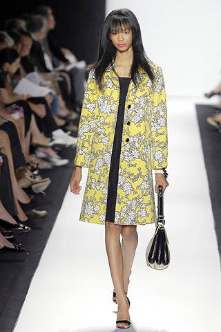 yellow floral coat with black dress