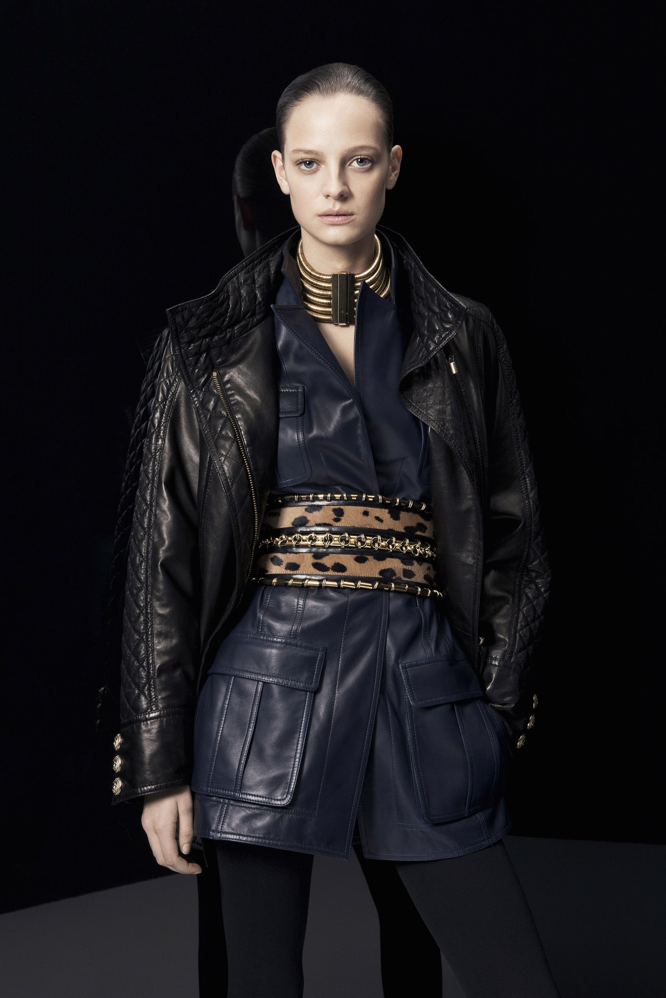 black leather jacket and blue dress