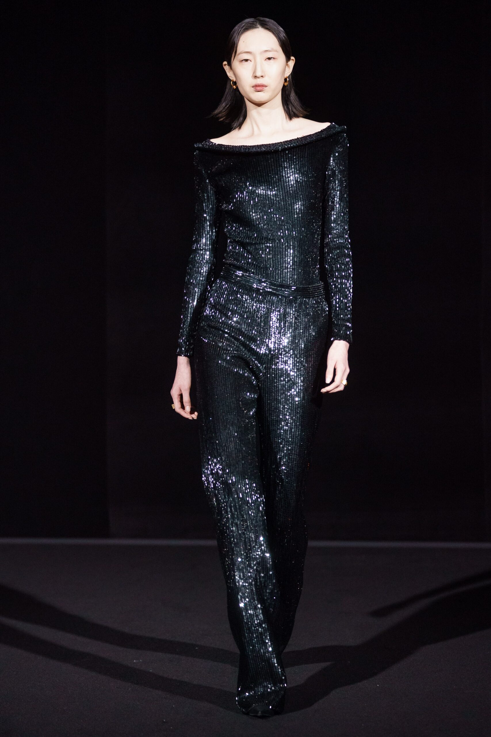 black sequin off-shoulder jumpsuit