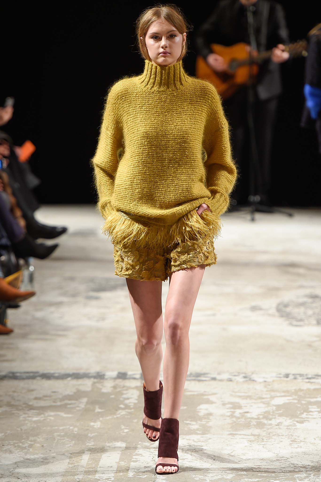yellow wool sweater with fringed shorts