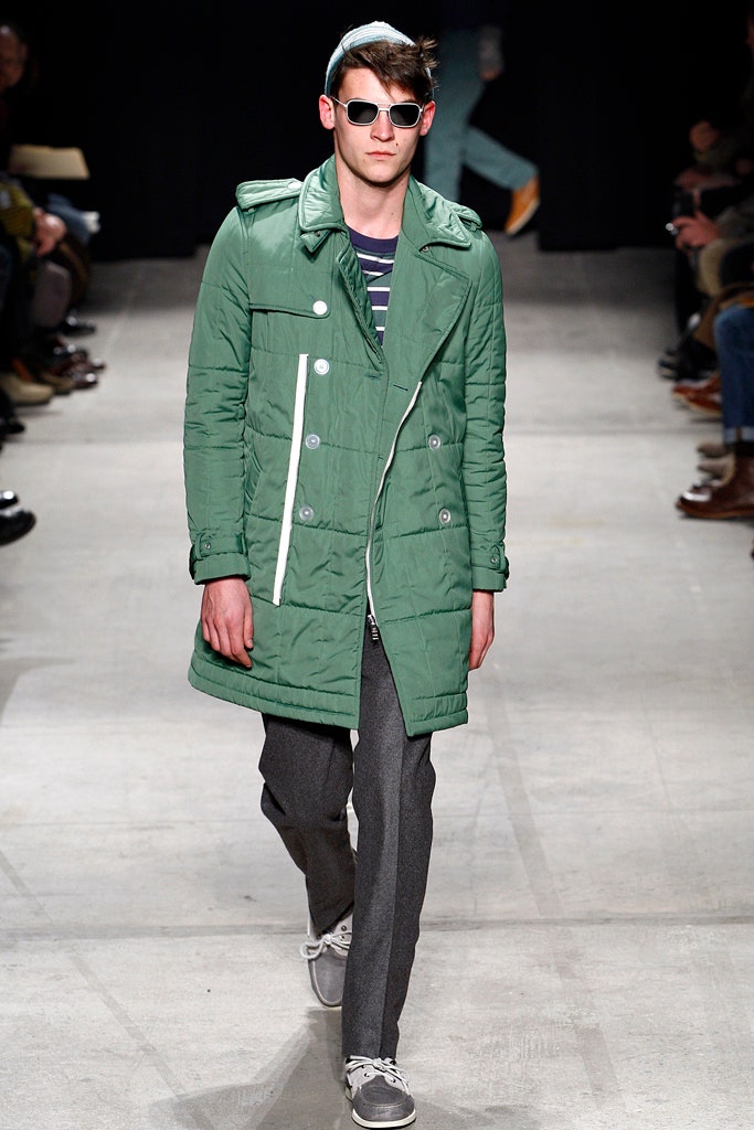 green coat with gray pants