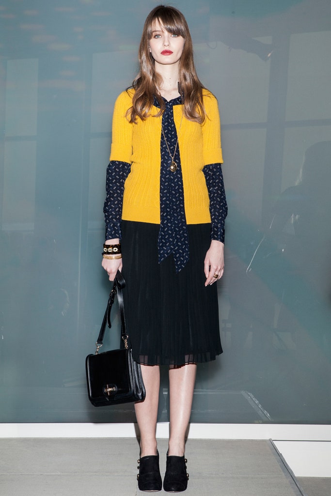 yellow fitted top with pleated skirt