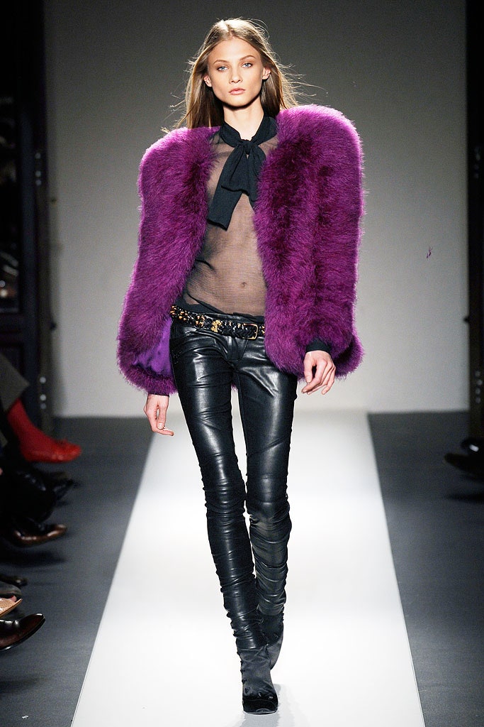 purple faux-fur coat with black top