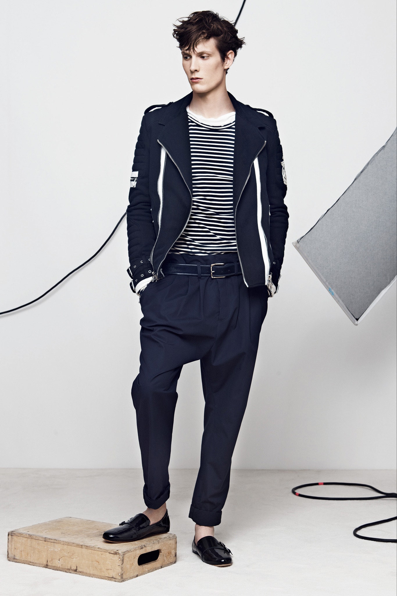 black fitted jacket with striped shirt